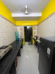 Kuchyň nebo kuchyňský kout v ubytování Galaxy Apartment