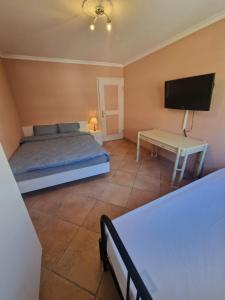 Postel nebo postele na pokoji v ubytování Grand appartement 4-8 personnes