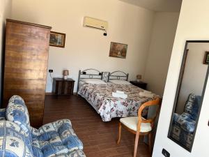 En eller flere senger på et rom på B&B Piandelidei