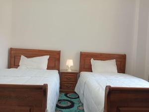 Кровать или кровати в номере Luxury King Bed with garden-Zayed Families only