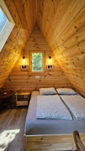 Säng eller sängar i ett rum på Lepa Lopa resort