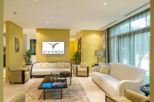 Khu vực ghế ngồi tại Vivienda Hotel Villas Granada