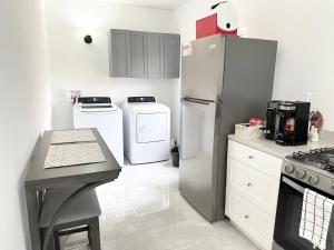 A kitchen or kitchenette at New! Bluestone Getaway in Christiansted USVI !