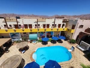 an aerial view of a hotel with a swimming pool at Delta Dahab Hotel in Dahab