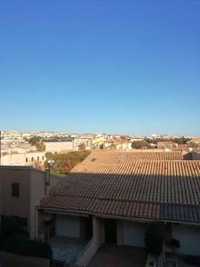 a roof of a house with tiles on it at Studio maison de la mer in Saint Pierre La Mer