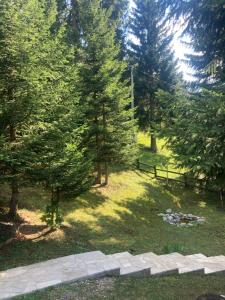 Zahrada ubytování Chalet Escapade with Sauna