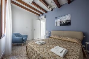 Posteľ alebo postele v izbe v ubytovaní HAMMAM Venice