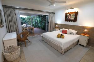 Ένα ή περισσότερα κρεβάτια σε δωμάτιο στο Fiddlewood Beach House - 13 sleeper +24 φωτογραφίες