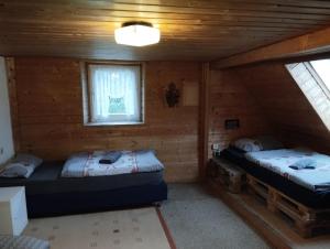 Ένα ή περισσότερα κρεβάτια σε δωμάτιο στο Monteurhaus Mühlbach :-)