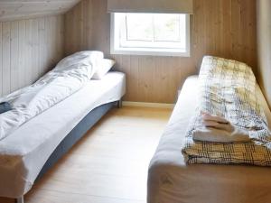 Postel nebo postele na pokoji v ubytování Holiday home averøy VI