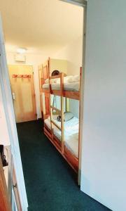 Кровать или кровати в номере Studio Tignes Val claret aux pieds des pistes