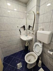 Koupelna v ubytování Booking Apartments Alone 2