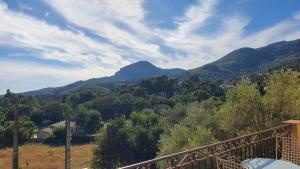 a view of a valley with mountains in the background at BIENVENUE in Le Revest-le-Eaux
