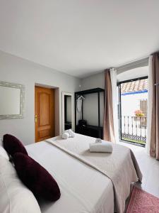 A bed or beds in a room at Ancha Village