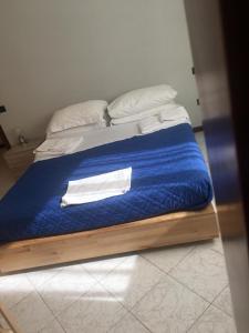 Postel nebo postele na pokoji v ubytování Giovanna's House