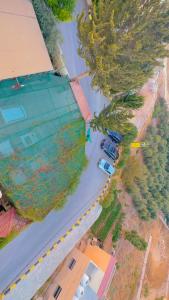 an overhead view of a street with cars on a road at Full panorama Jerash (PLUS) in Jerash