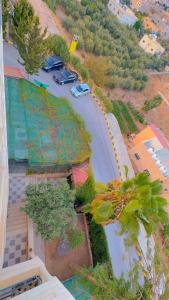 an overhead view of a street with cars on a road at Full panorama Jerash (PLUS) in Jerash