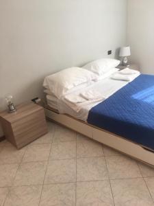 Postel nebo postele na pokoji v ubytování Giovanna's House