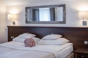 Łóżko lub łóżka w pokoju w obiekcie Sielanka Pokoje Hotelowe, Restauracja - Ustroń