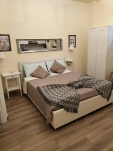 a bedroom with a large bed in a room at BolognaFiera in Bologna +21 photos