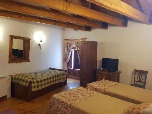 Postel nebo postele na pokoji v ubytování Hotel Rincón Castellano