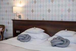 Łóżko lub łóżka w pokoju w obiekcie Sielanka Pokoje Hotelowe, Restauracja - Ustroń