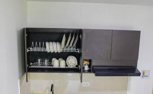 Virtuvė arba virtuvėlė apgyvendinimo įstaigoje Apartamento cómodo, agradable y económico