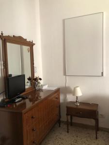 TV a/nebo společenská místnost v ubytování HOME TONINO