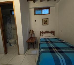 Postel nebo postele na pokoji v ubytování Hostal SoleMare