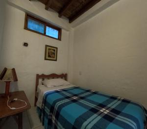 Postel nebo postele na pokoji v ubytování Hostal SoleMare