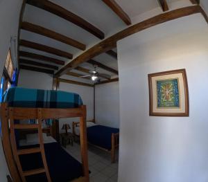 Postel nebo postele na pokoji v ubytování Hostal SoleMare