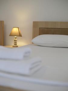 Letto o letti in una camera di On The Rocks