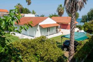 Zahrada ubytování LeMaMi Seafront Bungalows