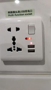 a machine with a hello kitty face on it at M18 Station 103,107 in Hong Kong