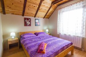 Postel nebo postele na pokoji v ubytování Apartments Andrić
