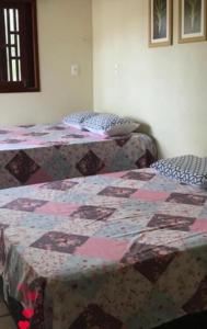 Cama o camas de una habitación en Casa de Japaratinga