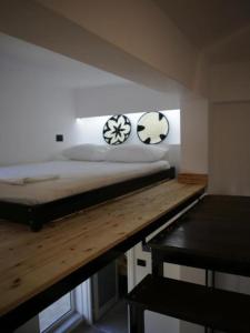Letto o letti in una camera di On The Rocks
