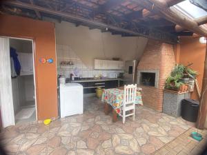 Kuchyň nebo kuchyňský kout v ubytování Quarto em Foz do Iguaçu