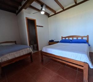 Postel nebo postele na pokoji v ubytování Hostal SoleMare