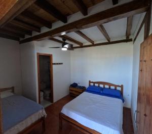 Postel nebo postele na pokoji v ubytování Hostal SoleMare