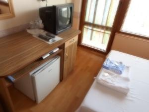 Un televizor și/sau centru de divertisment la Guest Rooms Ribarska Hizha