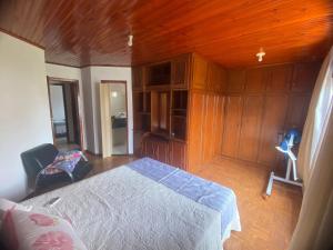 Postel nebo postele na pokoji v ubytování Quarto em Foz do Iguaçu