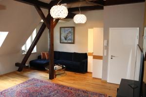 Ein Sitzbereich in der Unterkunft Apartmenthaus am Dom mit Parkplatz