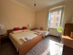 Krevet ili kreveti u jedinici u okviru objekta Vasto apt panoramico 3 min mare