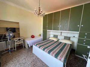 Krevet ili kreveti u jedinici u okviru objekta Vasto apt panoramico 3 min mare