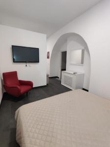 Giường trong phòng chung tại Il Cardinale