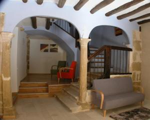 A seating area at Hotel Portal Del Matarraña