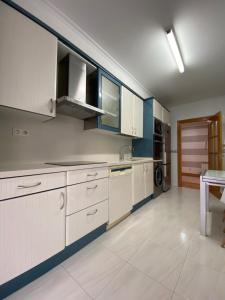 A kitchen or kitchenette at Apartamento Canela