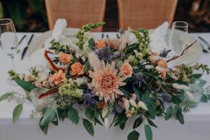 a bouquet of flowers sitting on a table at Manatee Palms in Bradenton