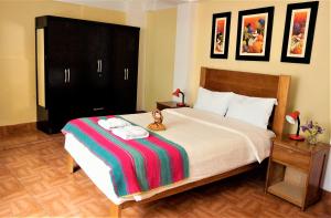 Llit o llits en una habitació de Eco Aventura Hostel Cusco